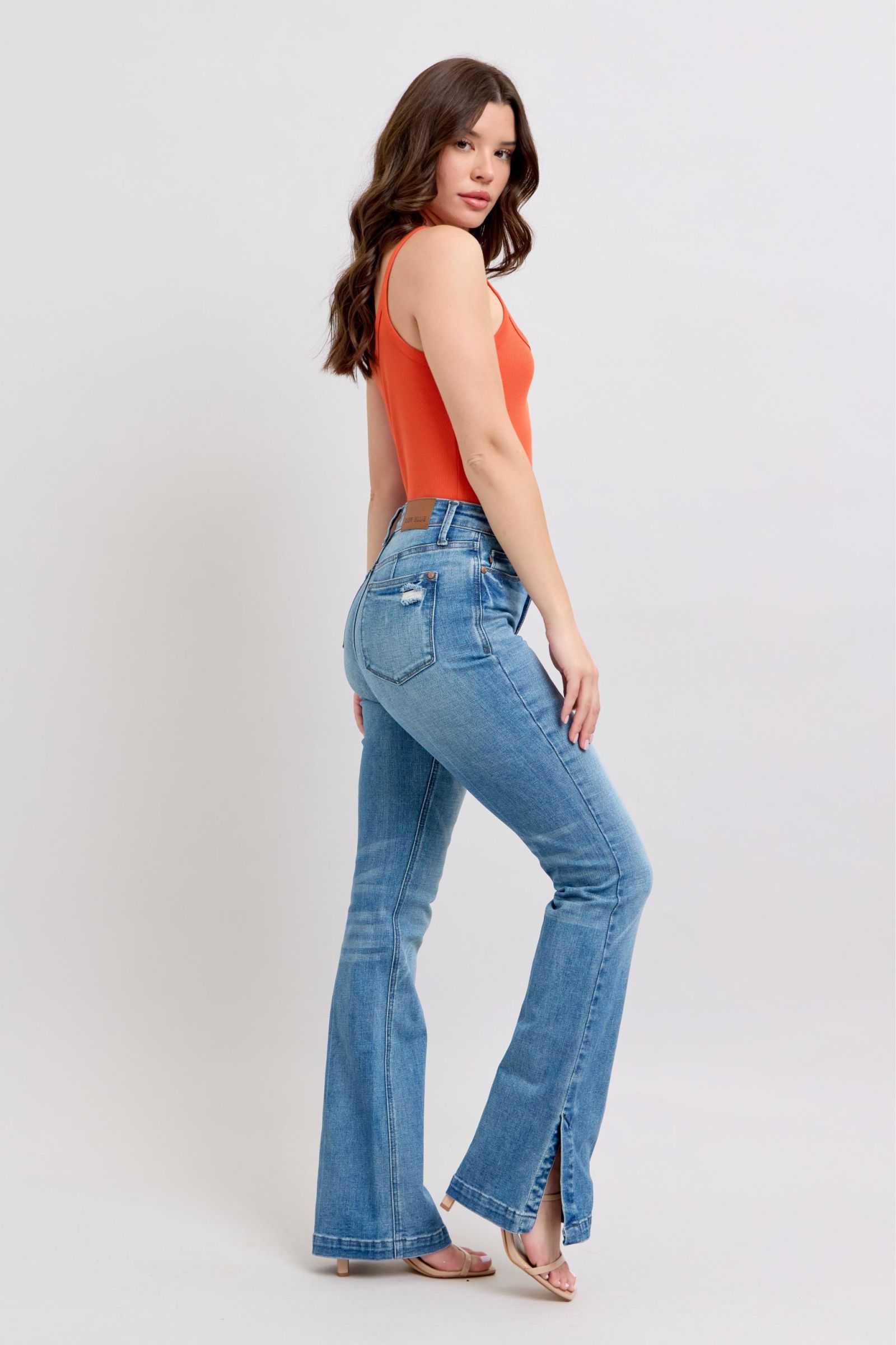 Judy Blue HW tummy control vintage wash side slit slim boot jeans.