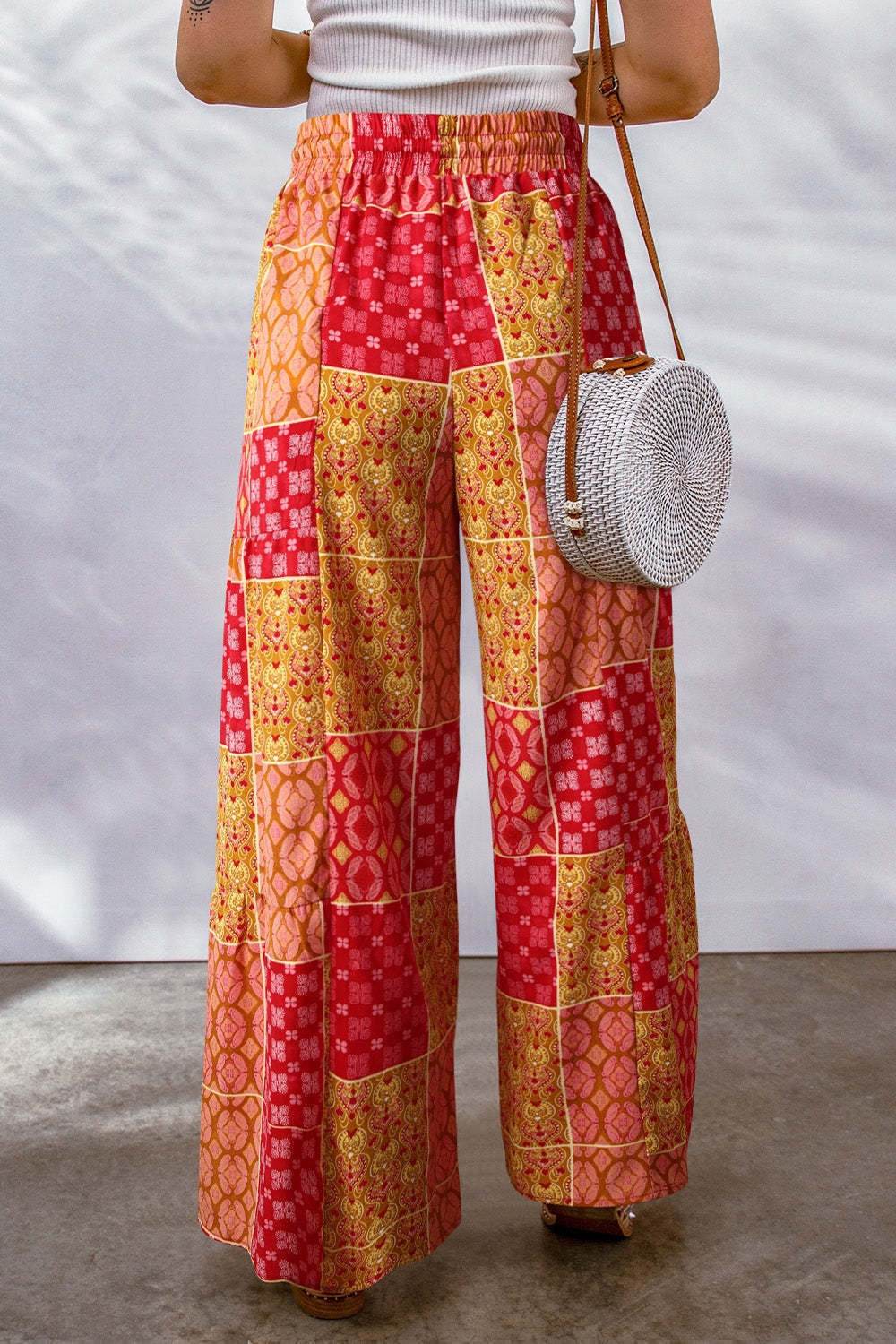 Full size drawstring printed wide leg pants in vibrant patchwork design.