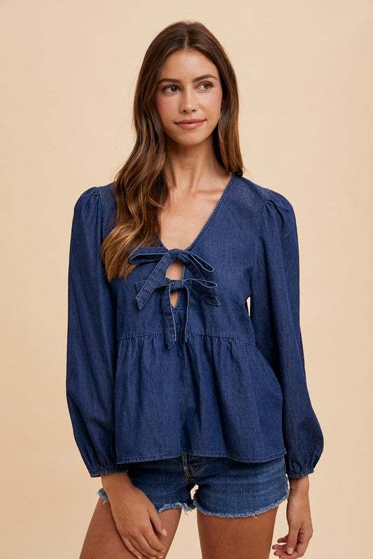 Annie Wear Tie Front Peplum Long Sleeve Denim Top with feminine design.