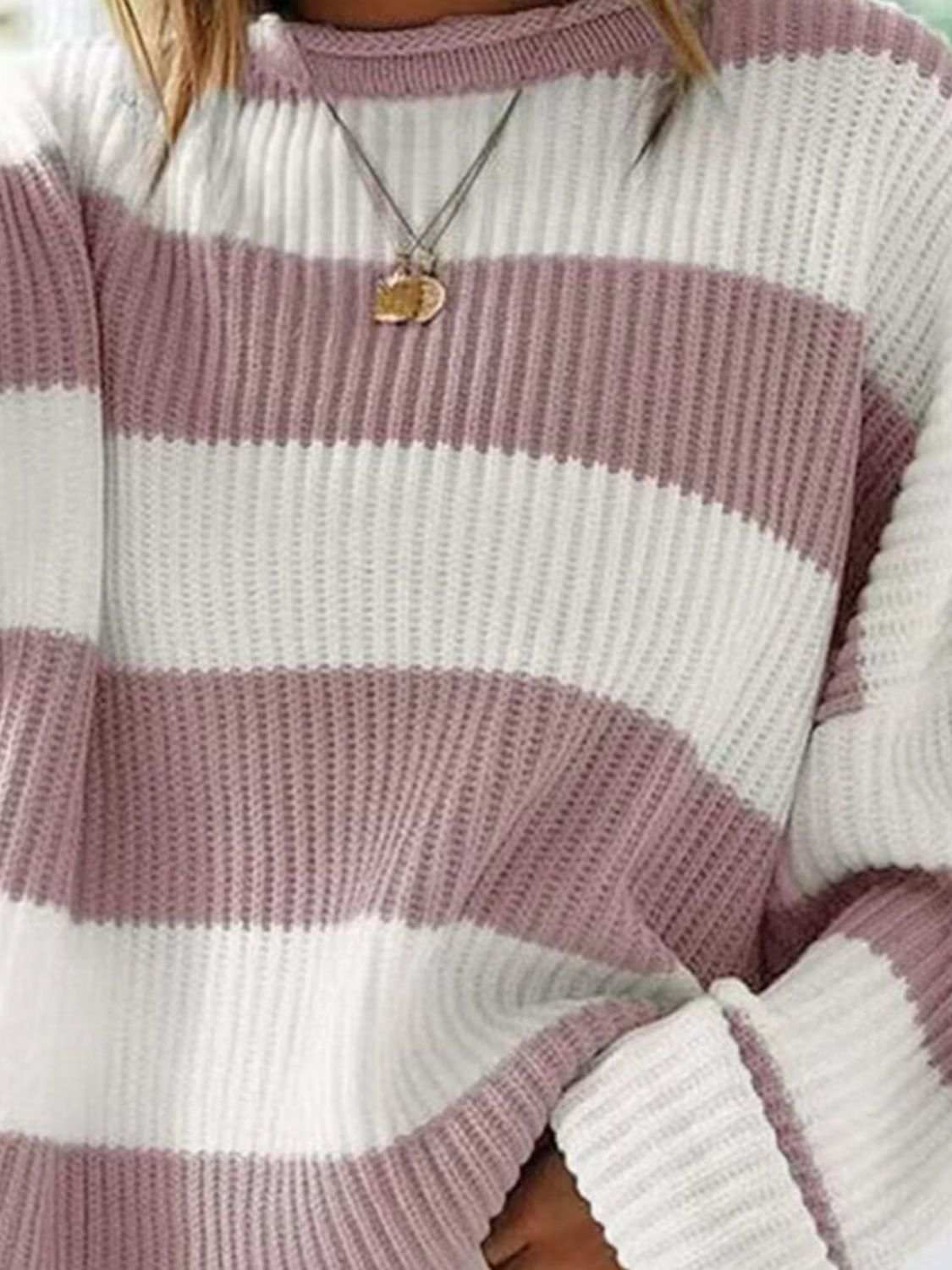 Round neck long sleeve sweater with striped pattern, slightly stretchy polyester material.