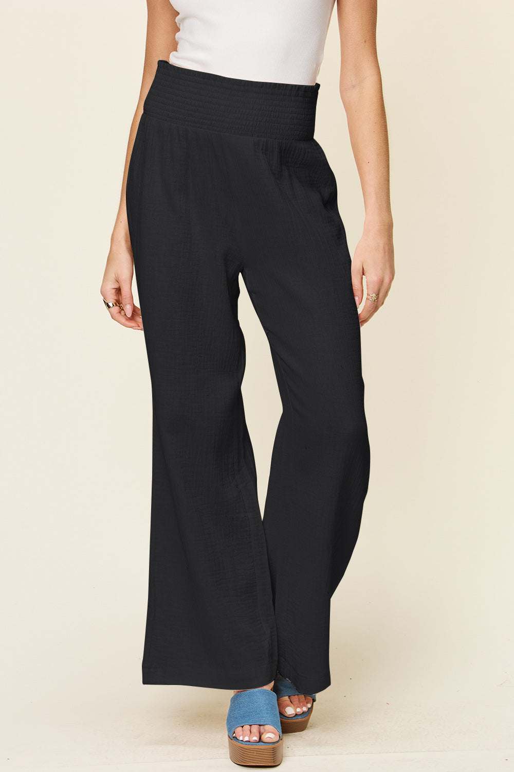 Double Take full size black smocked waist wide leg pants in cotton.