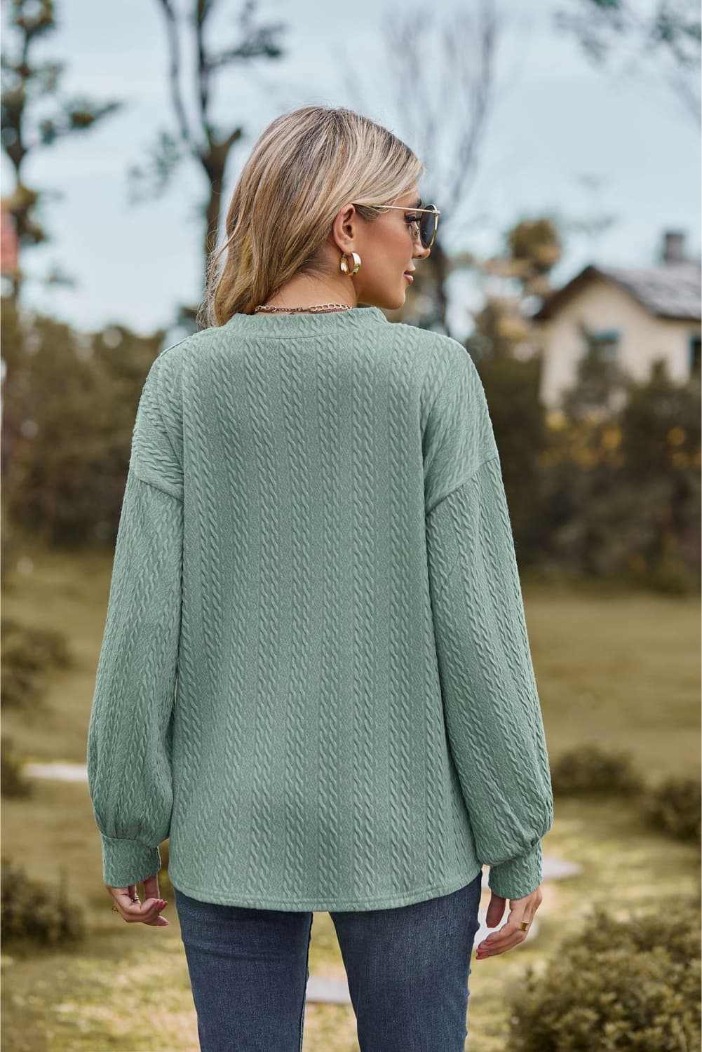 V-Neck Dropped Shoulder Blouse in soft green, casual style with long sleeves.