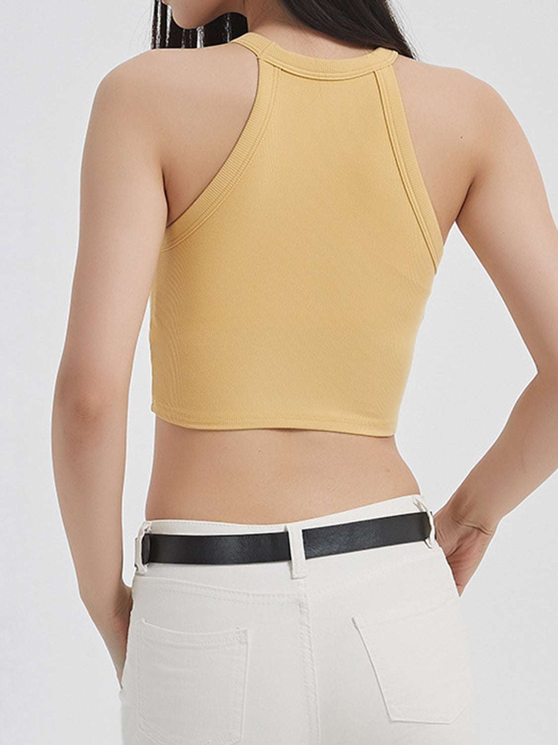 Ribbed Grecian neck cropped tank with chest pads, beige, back view, stretchy fabric.