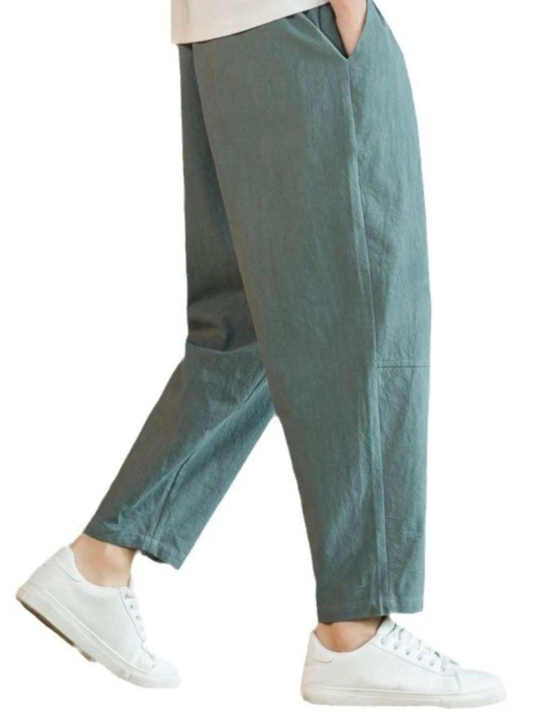 Plus size drawstring pants with pockets, cotton and flax blend, side view.
