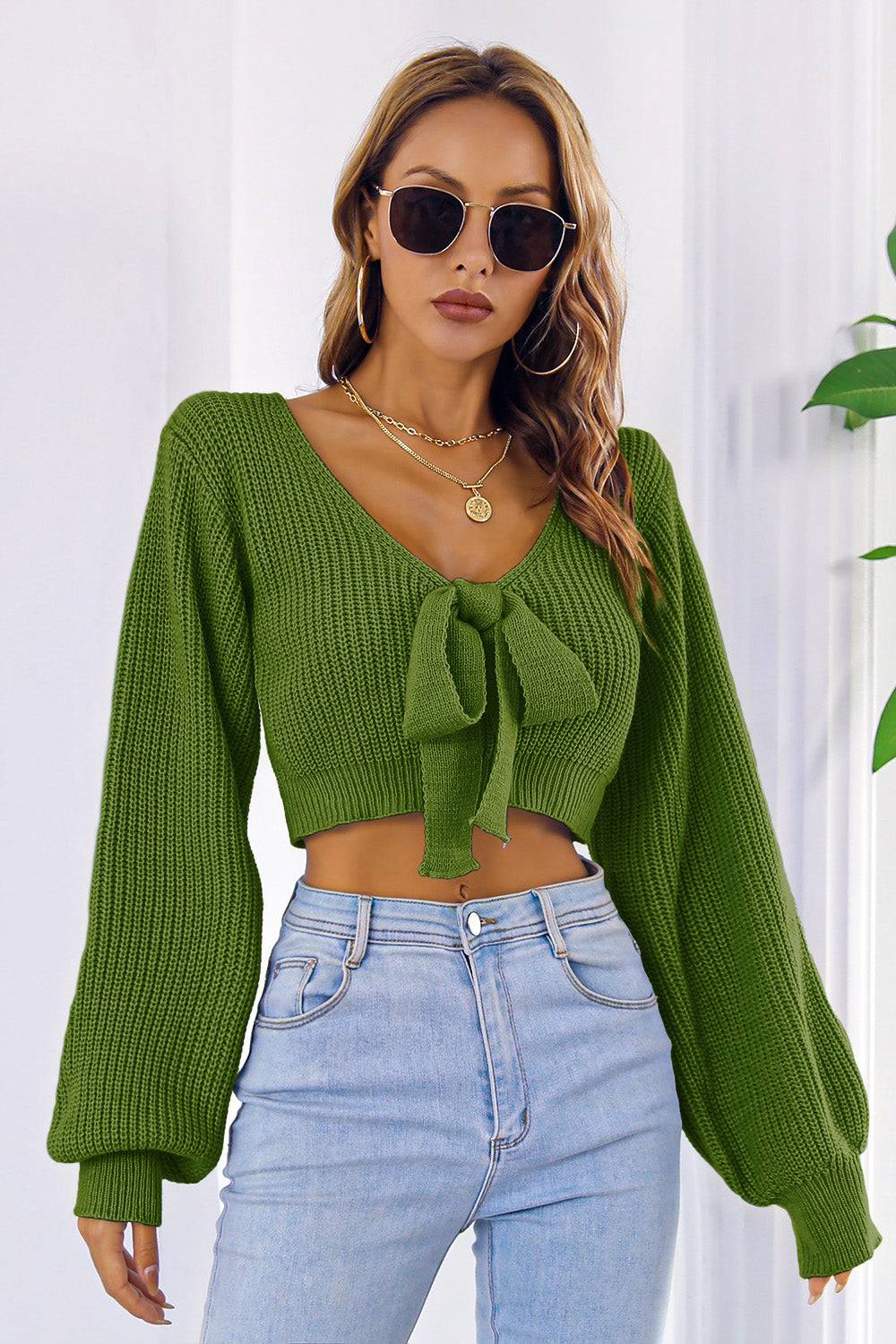 Bow V-Neck Long Sleeve Cropped Sweater in green with tie detail.