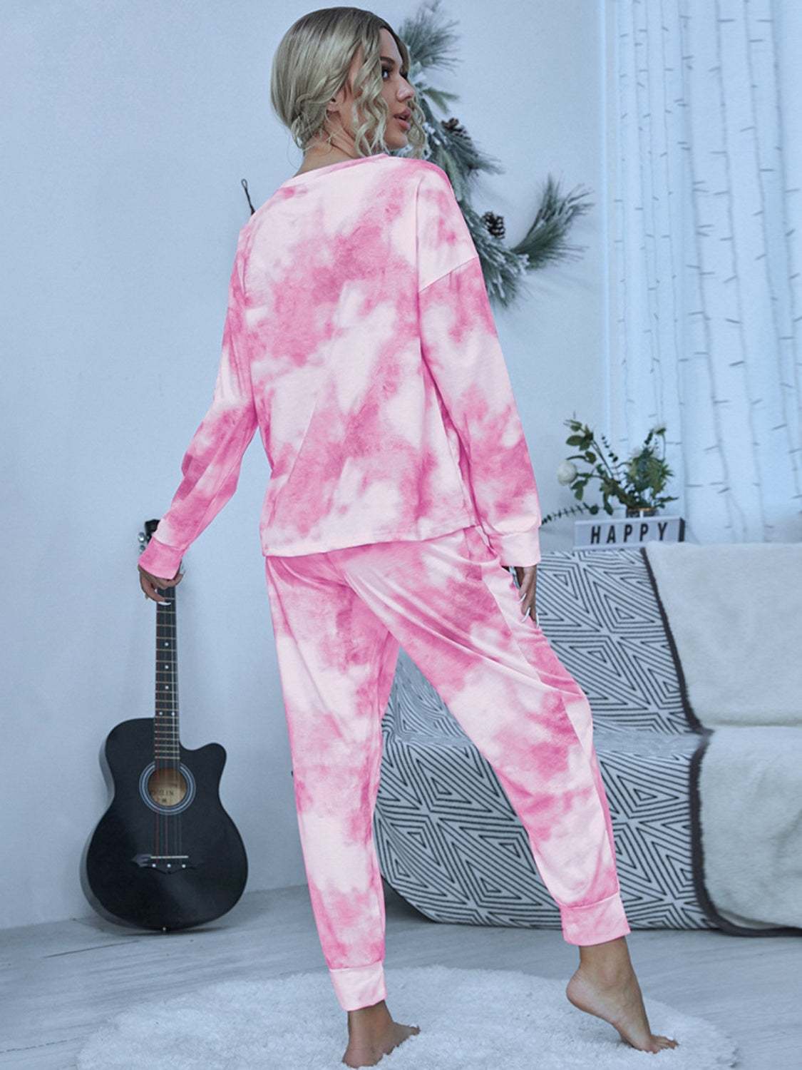 Shiny tie-dye round neck top and pants lounge set in pink.