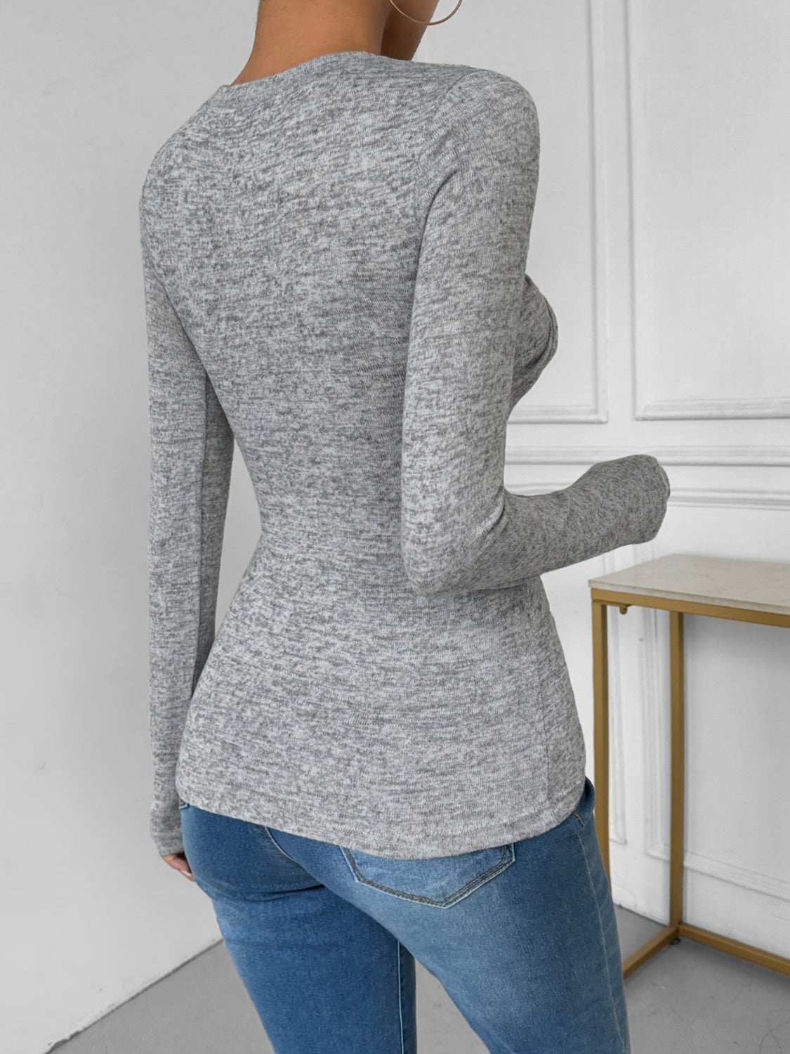 Perfee Twisted Round Neck Long Sleeve T-Shirt in gray, highly stretchy material.
