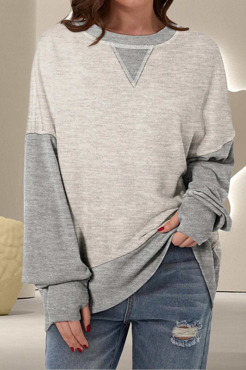 Contrast round neck long sleeve sweatshirt in light gray and dark gray, casual fit.