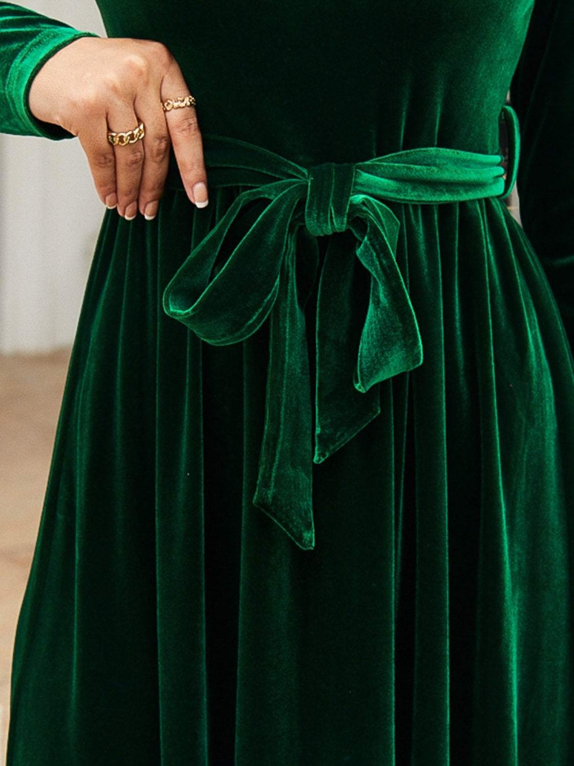 Tie front round neck long sleeve maxi dress in green velvet fabric.