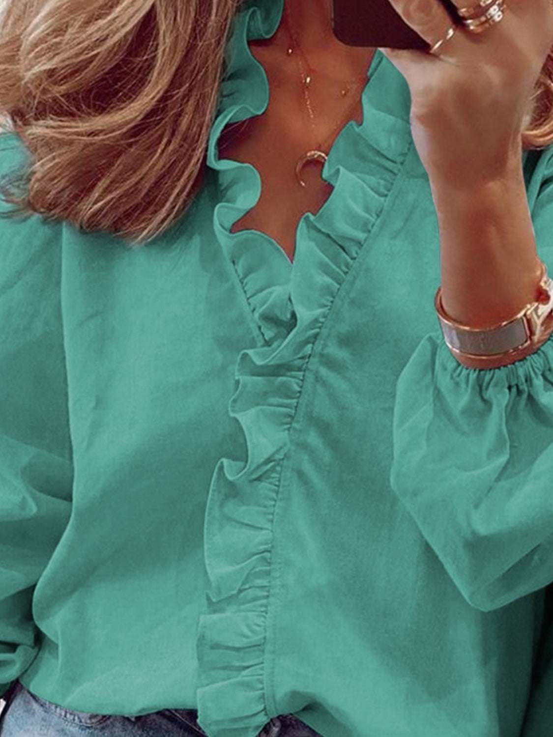 Full size ruffled V-neck long sleeve blouse in teal.