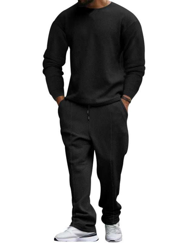 Men's long-sleeved round-neck casual suit in solid black, polyester blend, autumn-winter knit style.
