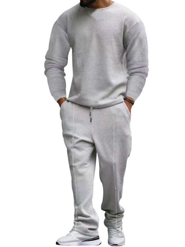 Men's long-sleeved round-neck casual suit in grey, autumn-winter knit fabric.