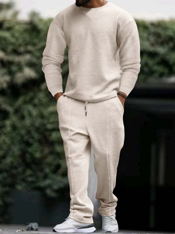 Men's long-sleeved round-neck casual suit, solid pattern, polyester-knit fabric, autumn-winter fashion.