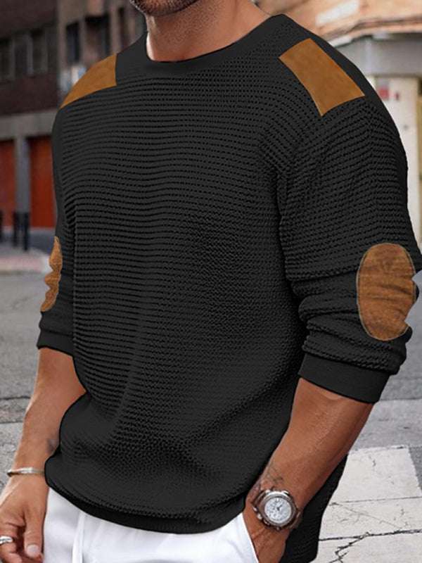 Men's autumn-winter patchwork textured sweater in black with brown accents, casual knit design.