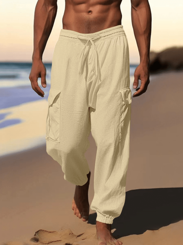Casual cuffed multi-pocket drawstring trousers in cotton, ideal for spring-summer.