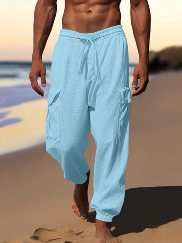 Casual cuffed multi-pocket drawstring trousers, 100% cotton, spring-summer style.