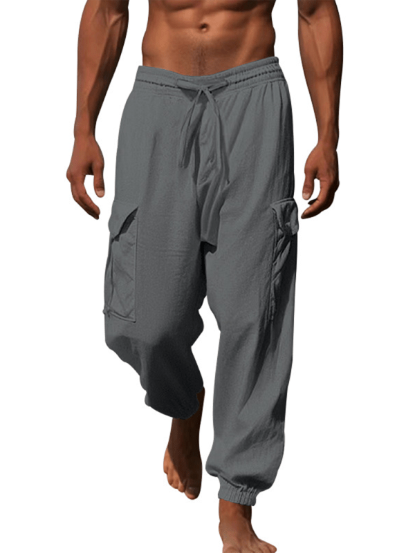 Casual cuffed multi-pocket drawstring trousers, 100% cotton, solid pattern.