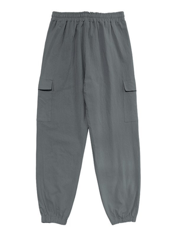 Casual cuffed drawstring trousers with multiple pockets, 100% cotton, solid pattern.