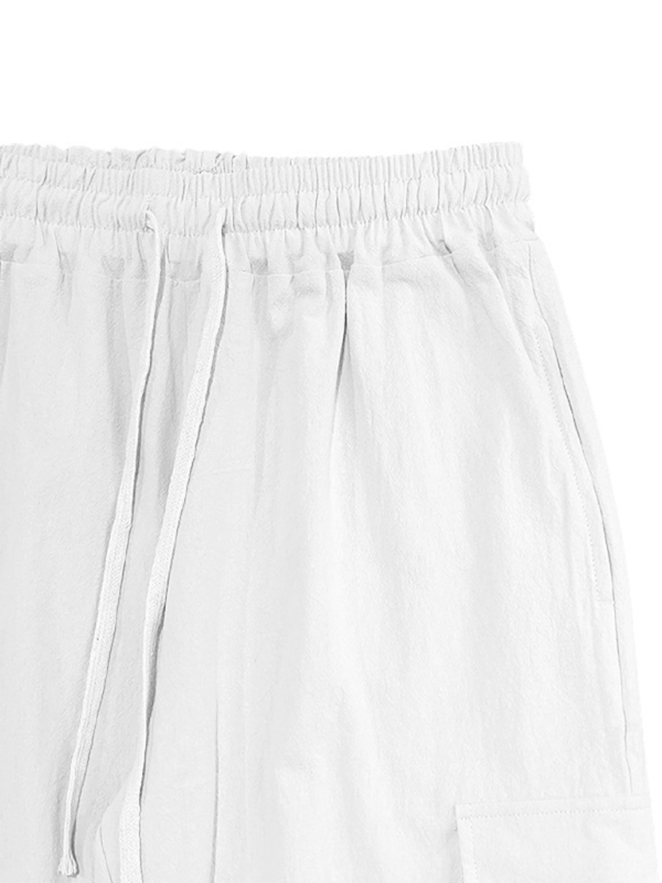 Casual cuffed multi-pocket drawstring trousers made from 100% cotton for spring-summer.