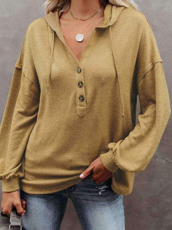 Women's casual loose solid color cardigan hoodie sweatshirt with buttons.