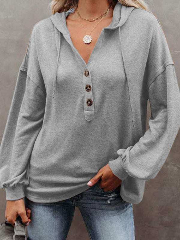 Women's cardigan hoodie, casual loose gray sweatshirt with V-neck, long sleeves, and button detail.