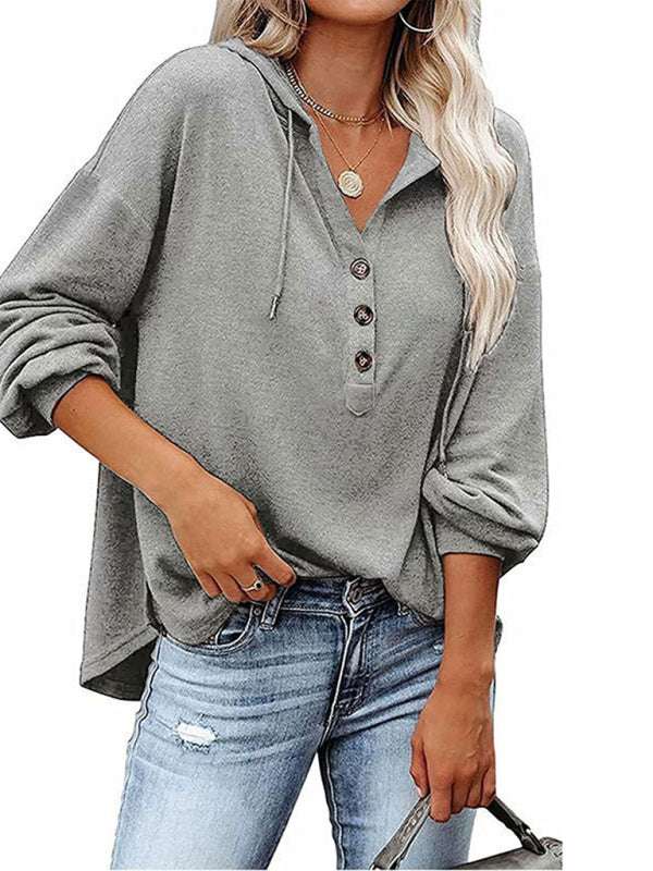 Women's casual loose solid color cardigan hoodie sweatshirt with button placket and lantern sleeves.