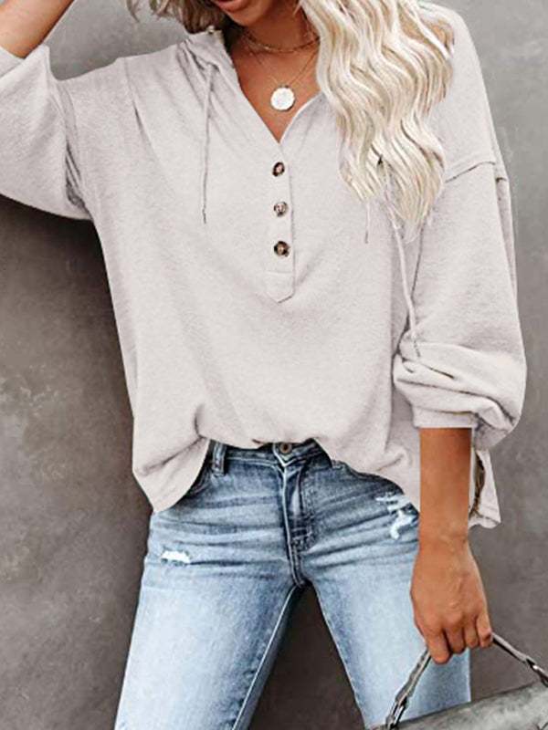 Women's cardigan hoodie with loose fit and solid color design.
