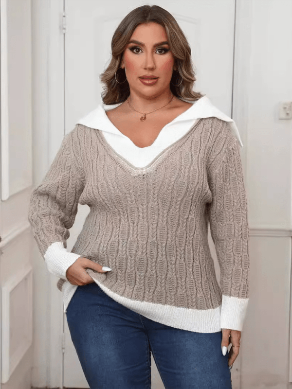 Large women's pullover sweater with contrast stitching, lapel navy collar.