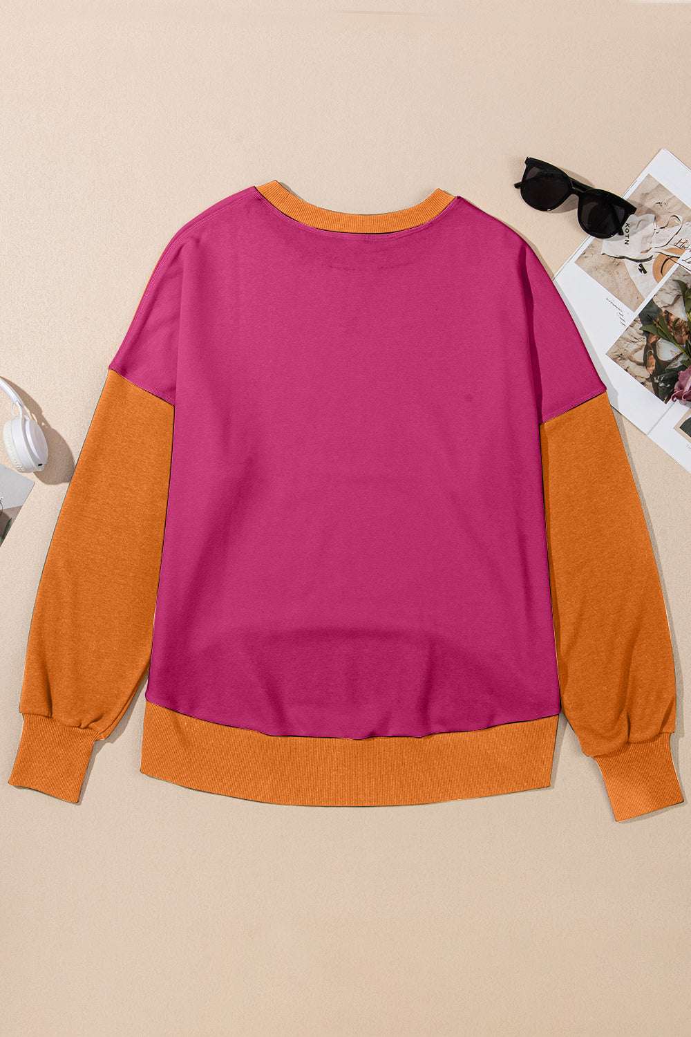 Contrast Round Neck Long Sleeve Sweatshirt with bold color blocks in pink and orange.