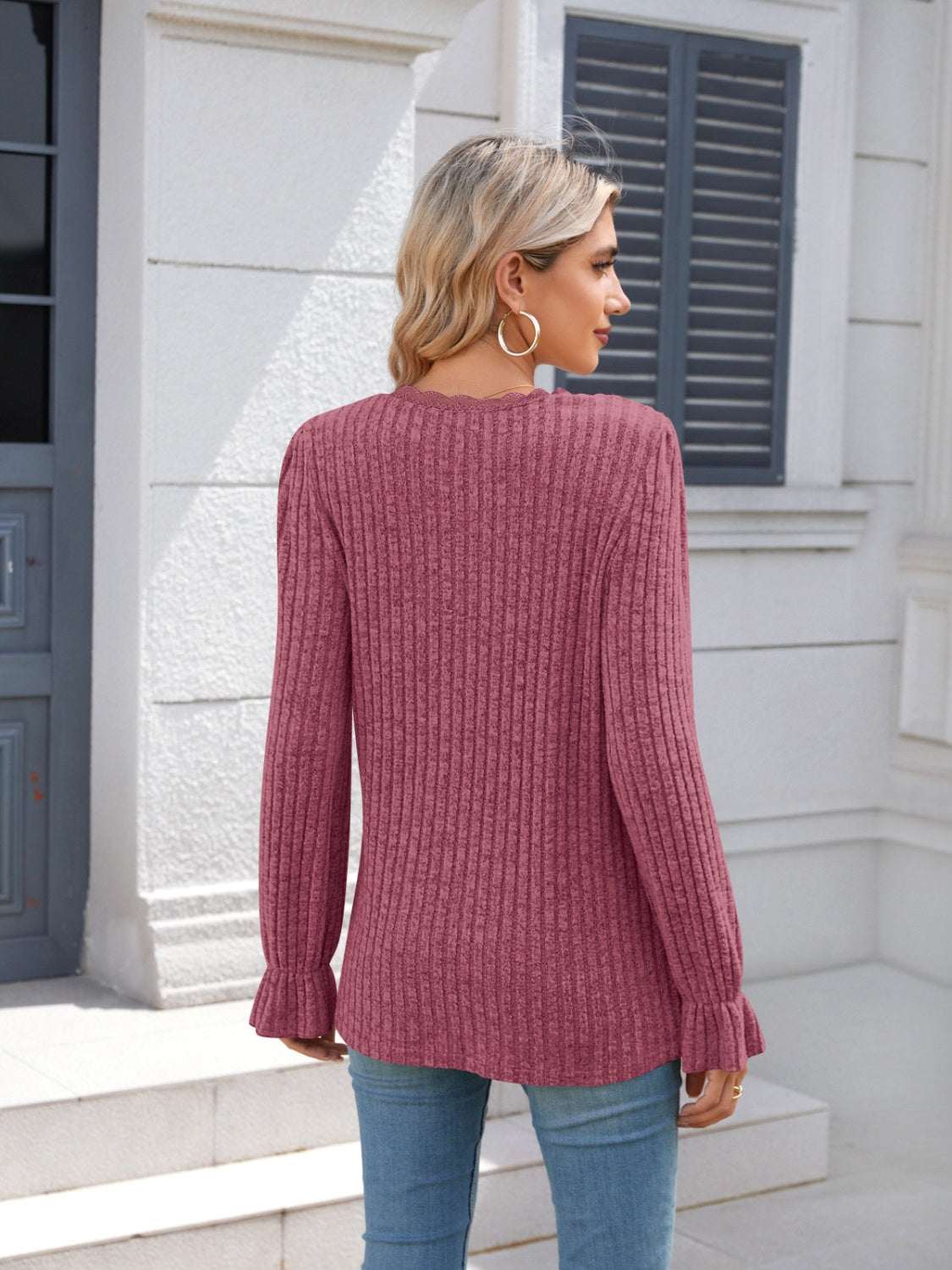 Lace detail V-neck long sleeve T-shirt in pink, featuring ruffled design and slightly stretchy fabric.