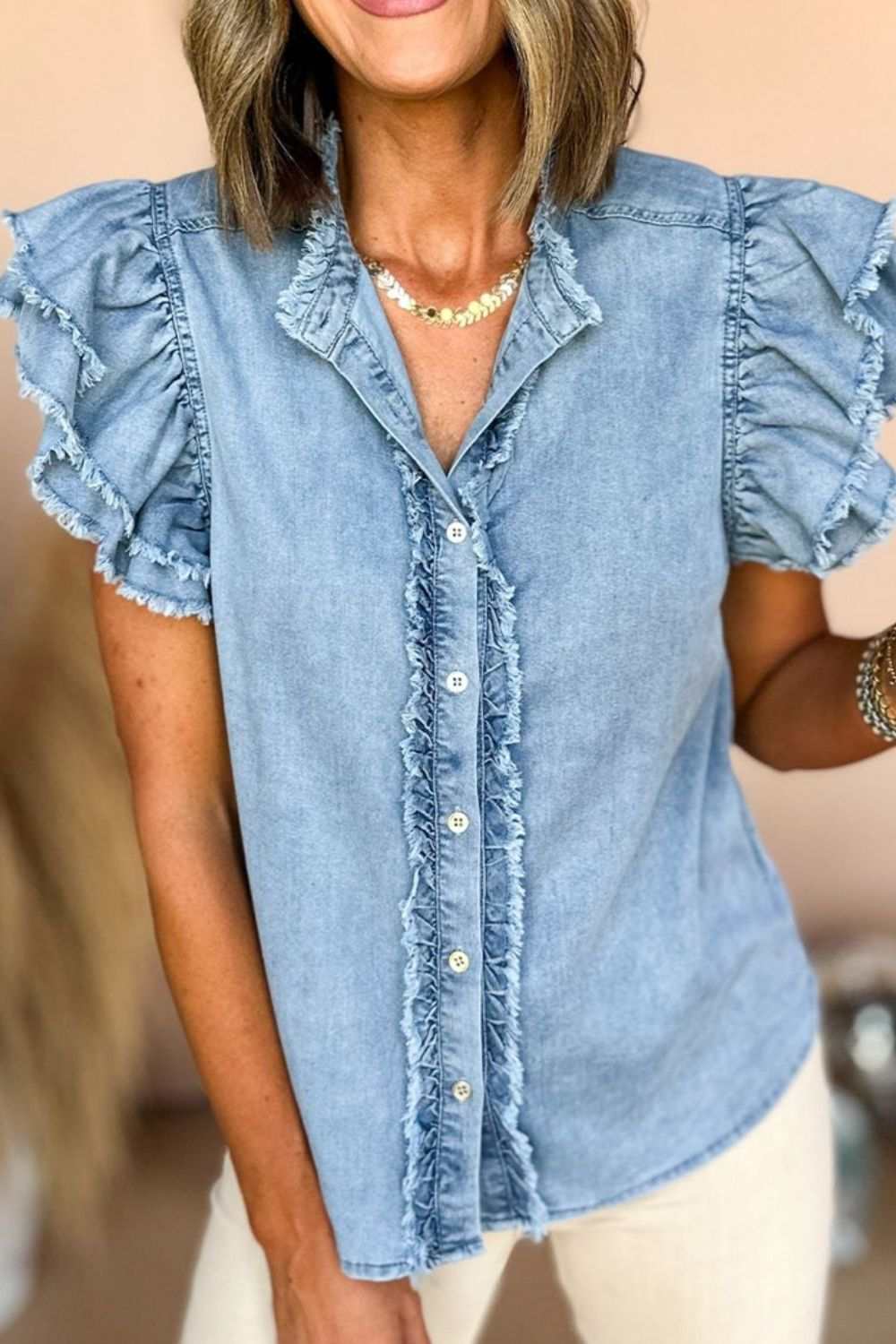 Button Down Raw Hem Ruffled Denim Shirt in 100% cotton with short sleeves.