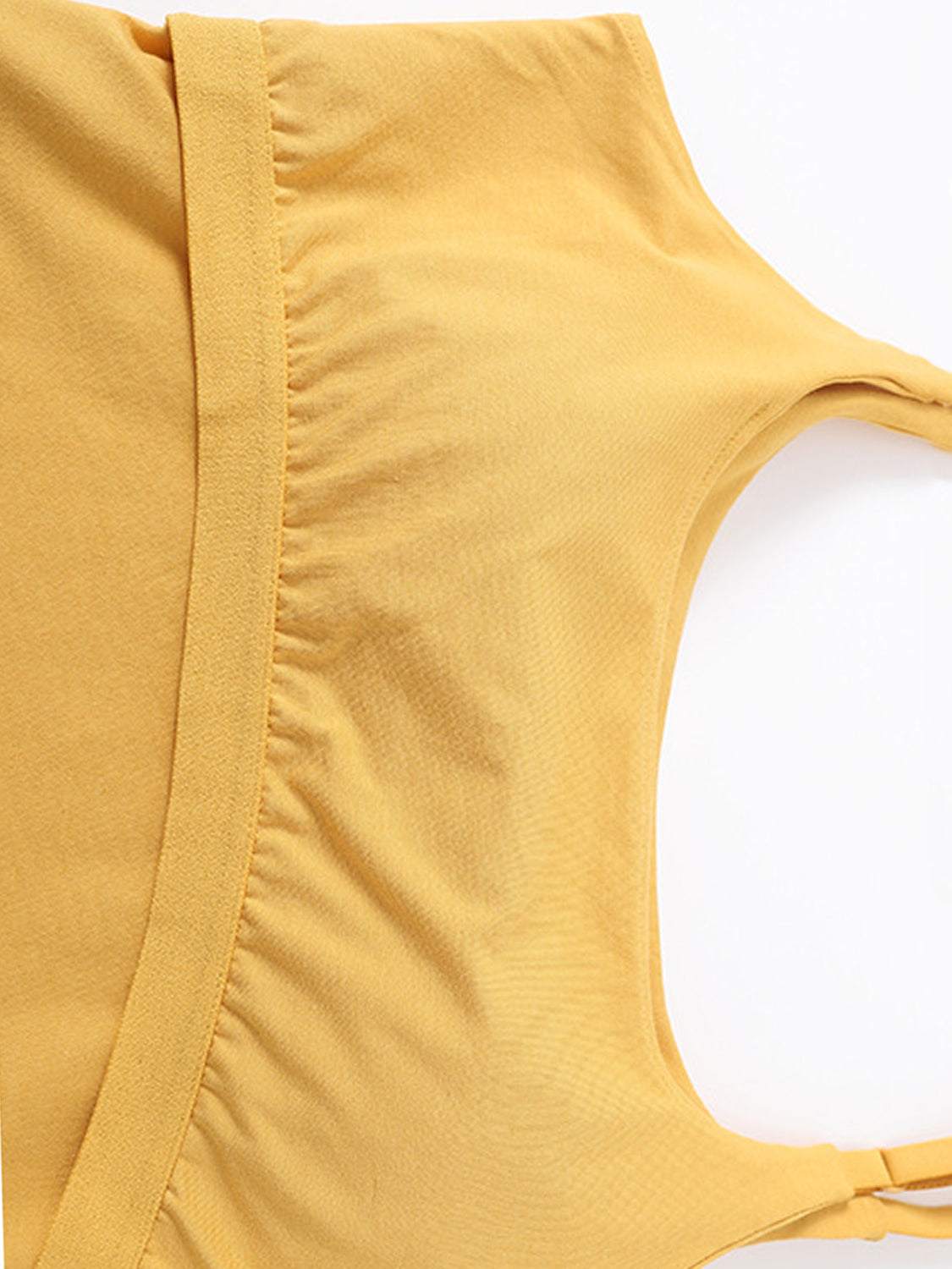 Yellow scoop neck cropped cami with chest pads, highly stretchy fabric.