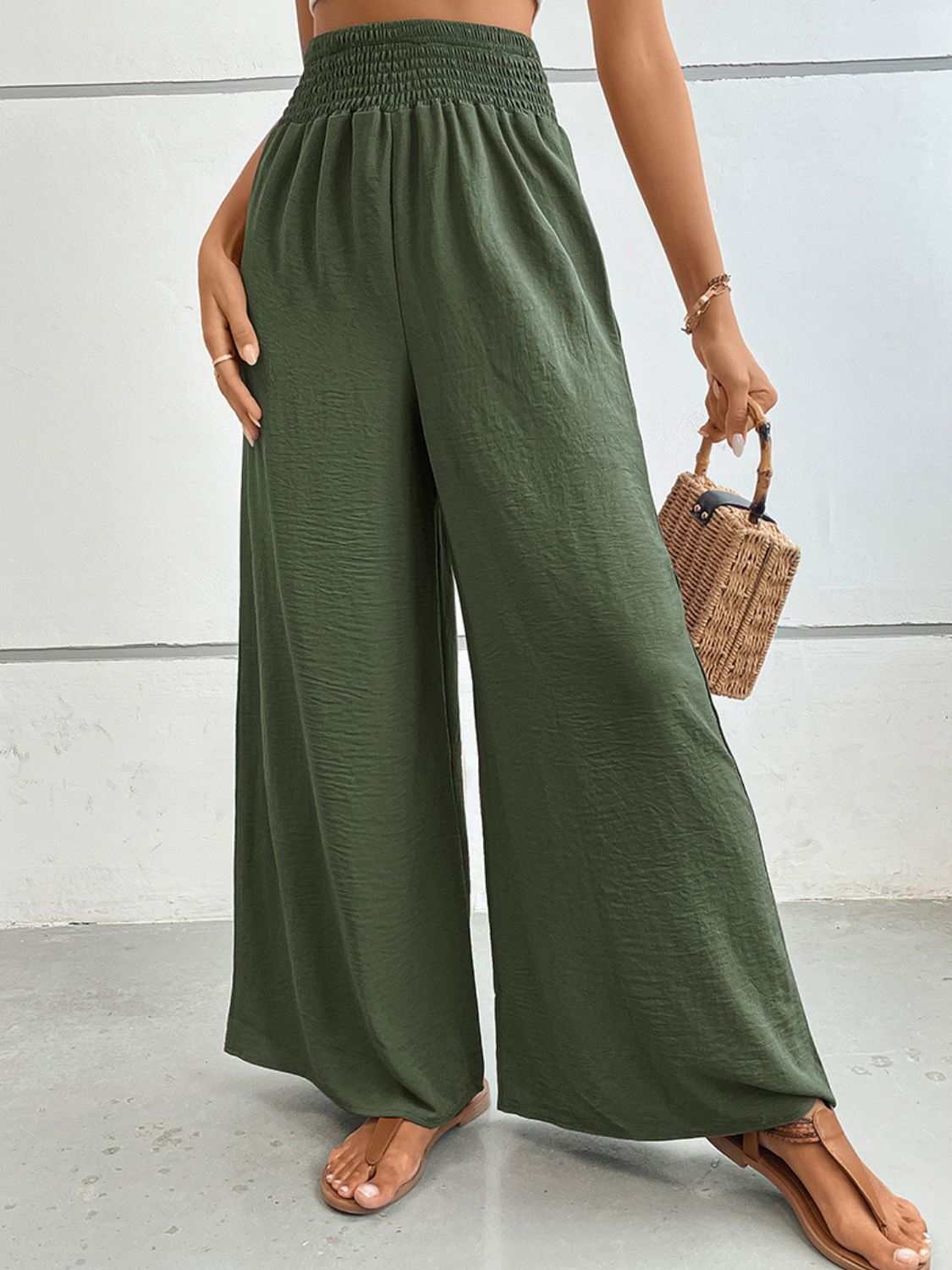 Wide waistband relax fit long pants in solid green, casual style.