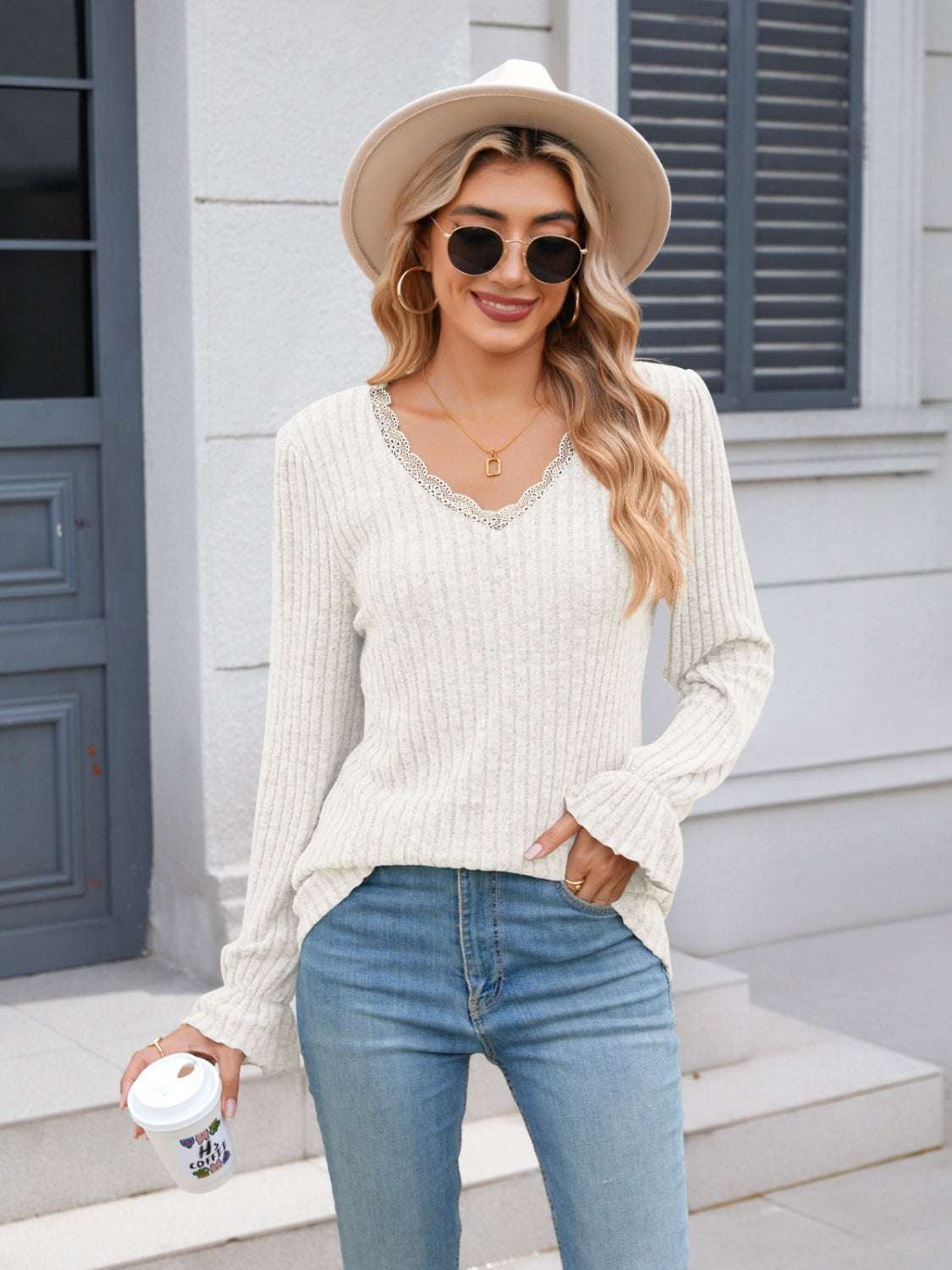 Lace detail V-neck long sleeve T-shirt with ruffled design.