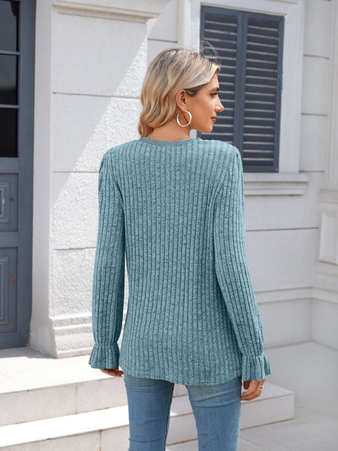 Lace detail V-neck long sleeve t-shirt, ruffled design, 100% polyester, slightly stretchy, light blue color.
