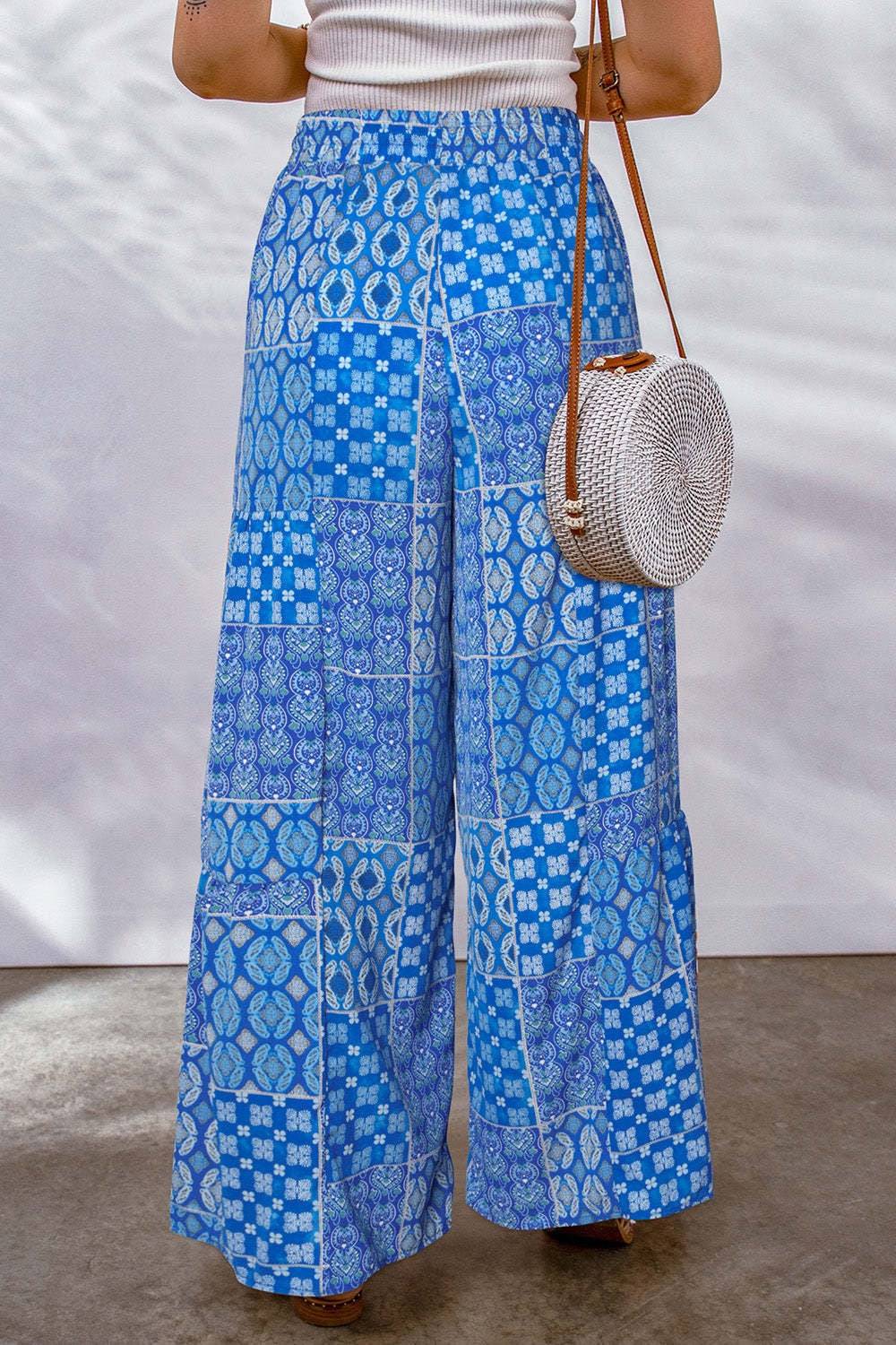 Full size blue drawstring printed wide leg pants with geometric pattern.