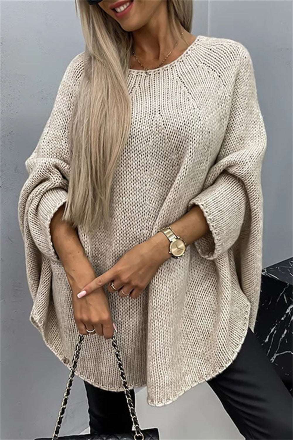 Round Neck Batwing Sleeve Sweater in beige worn by model.