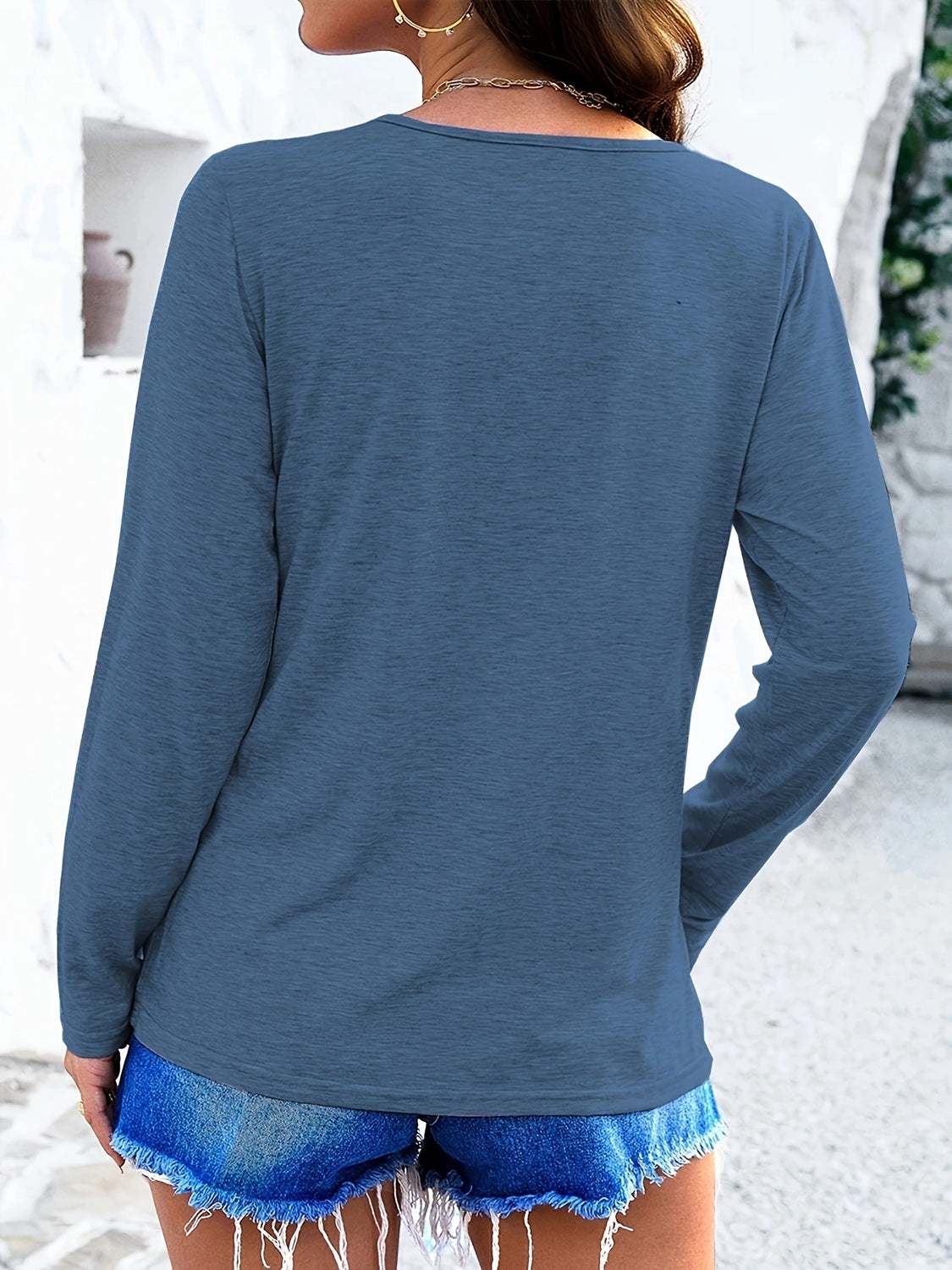 Women's crisscross V-neck long sleeve T-shirt in blue, casual style.