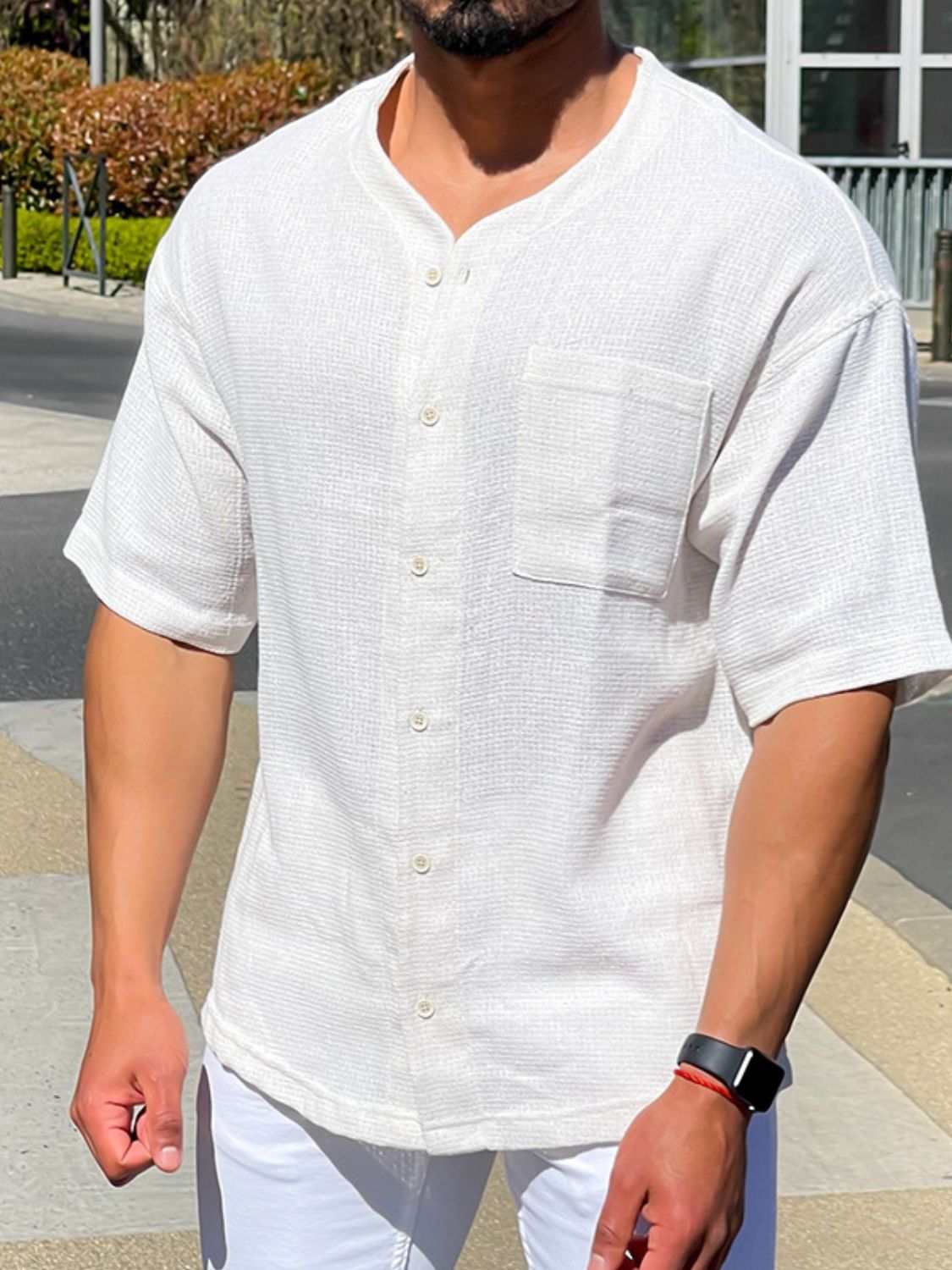 Men's plus size chest pocket button down shirt, slightly stretchy material.