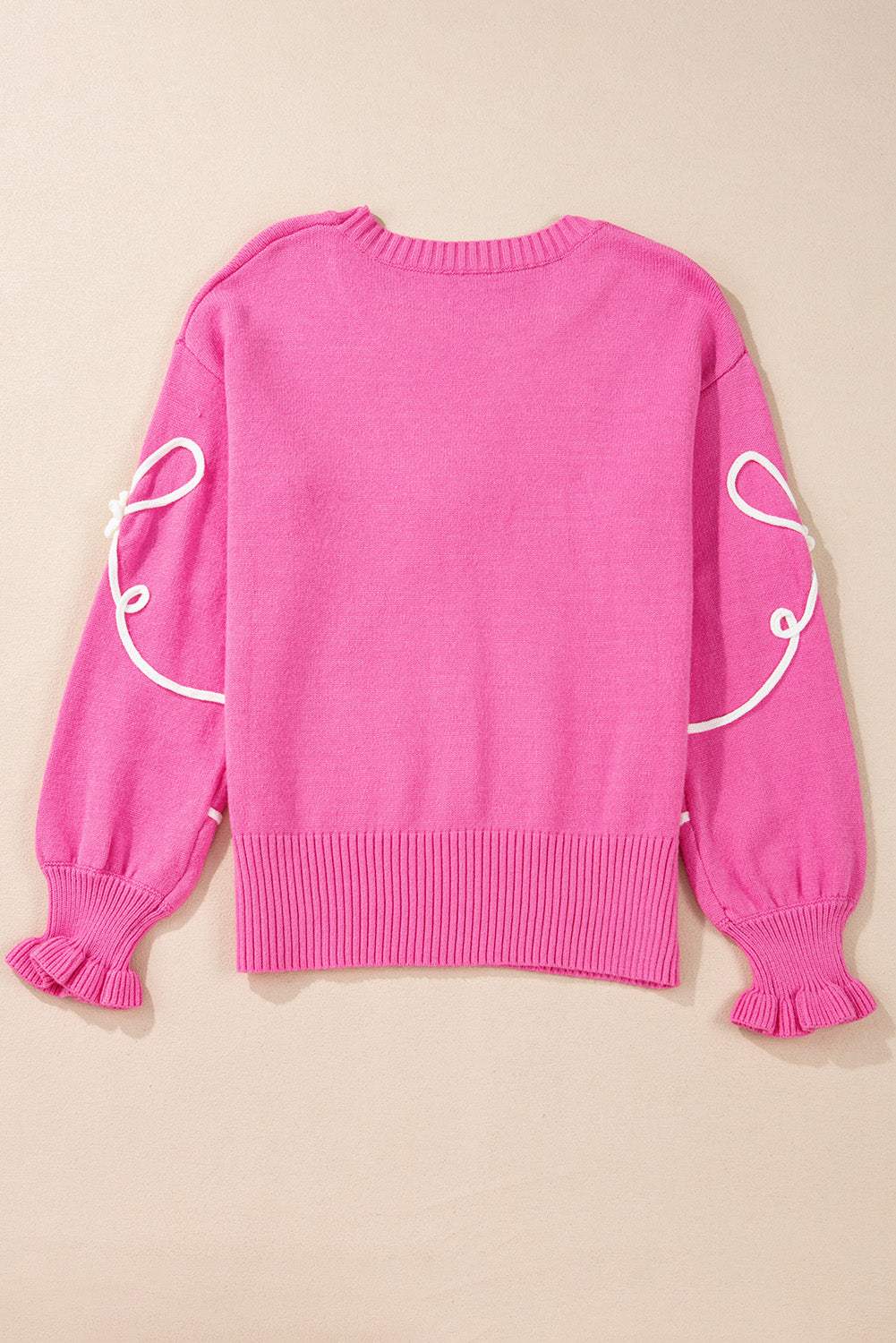 Pink bow round neck dropped shoulder sweater, slightly stretchy with ribbed cuffs and hem.