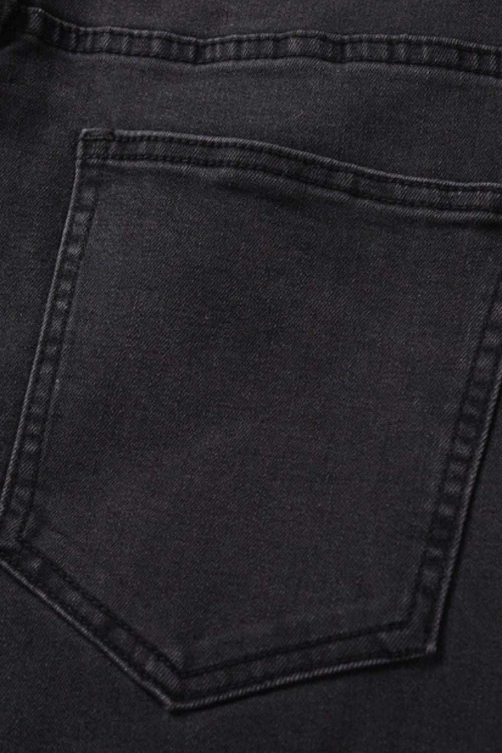 Men's washed bootcut jeans with back pocket detail, no stretch, cotton-polyester blend.