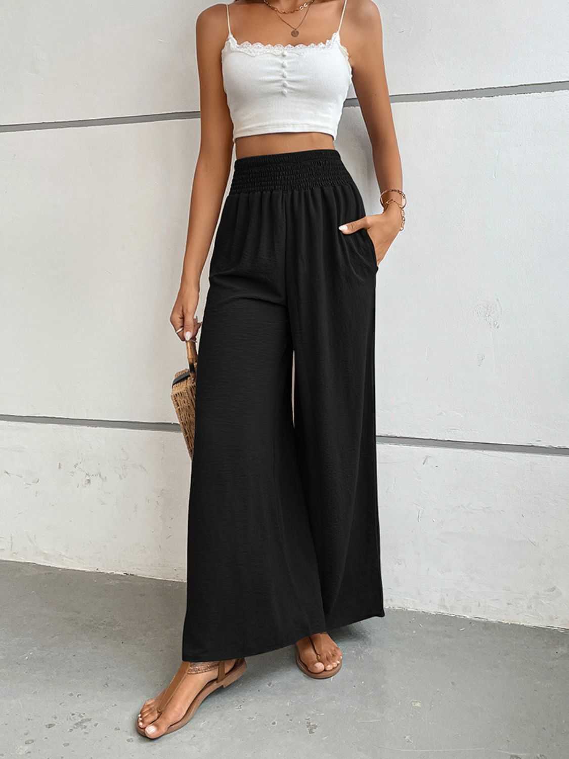 Casual solid long pants with wide waistband, featuring a relaxed fit and basic style.