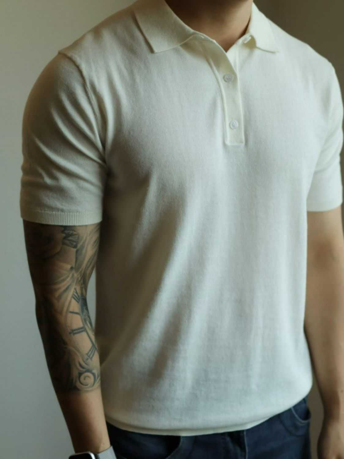 Men's plus size short sleeve polo shirt with button detail in off-white.