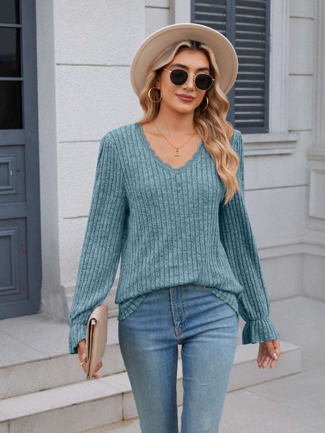 Lace detail V-neck long sleeve T-shirt with ruffled design.
