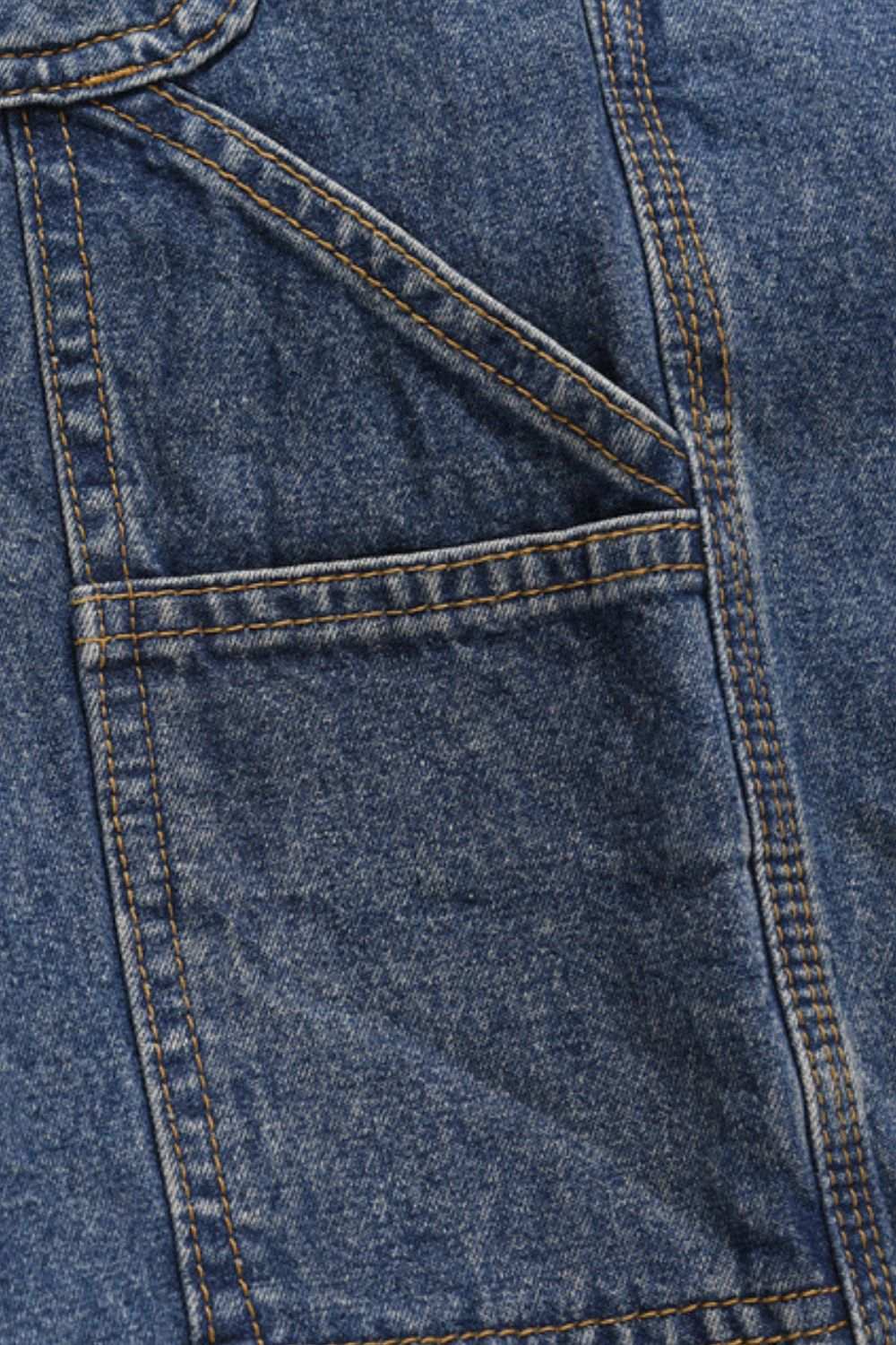 Close-up of Men's Washed Denim Bermuda Shorts showcasing pocket detail and stitching.
