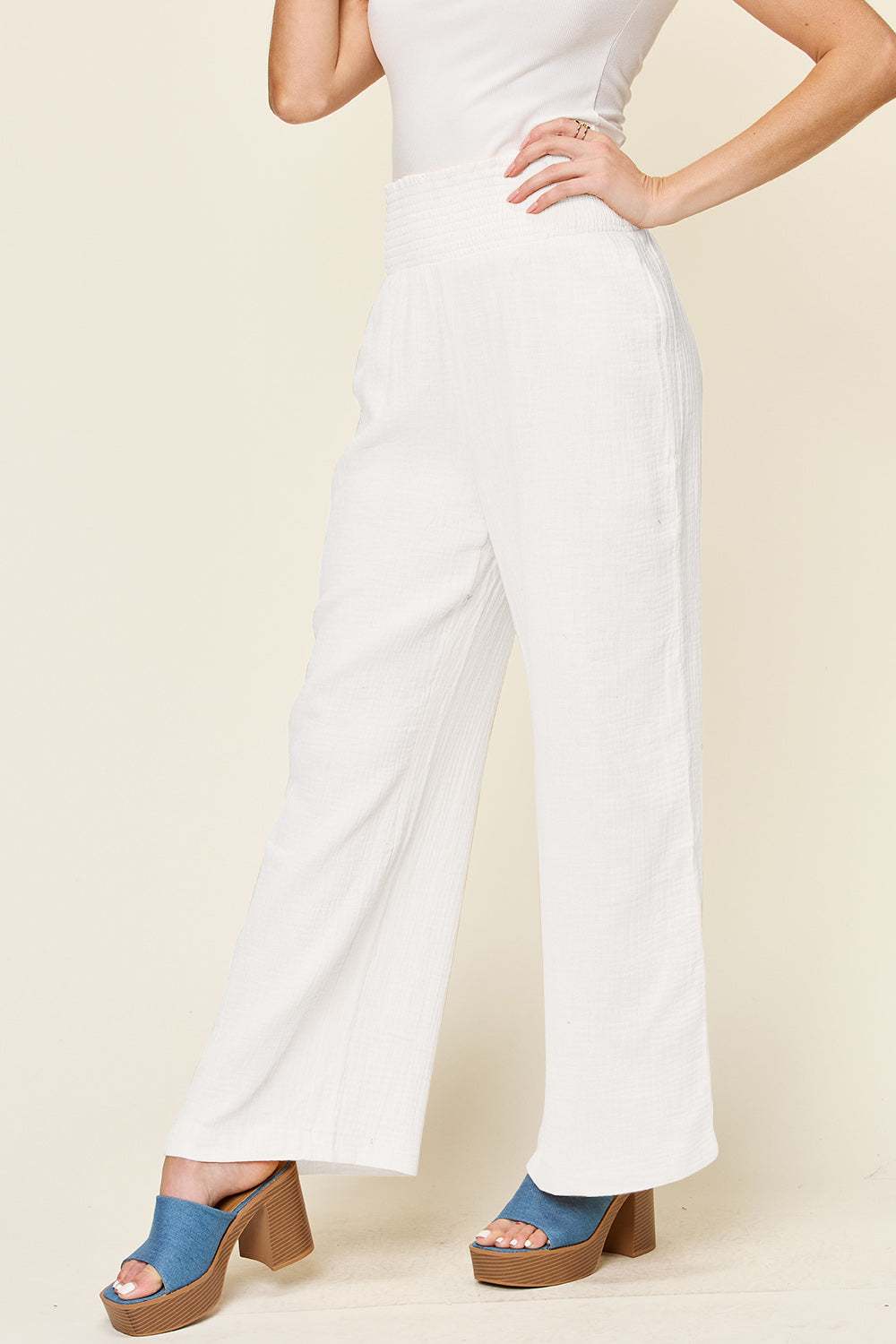 Double Take full-size texture smocked waist wide leg cotton pants.