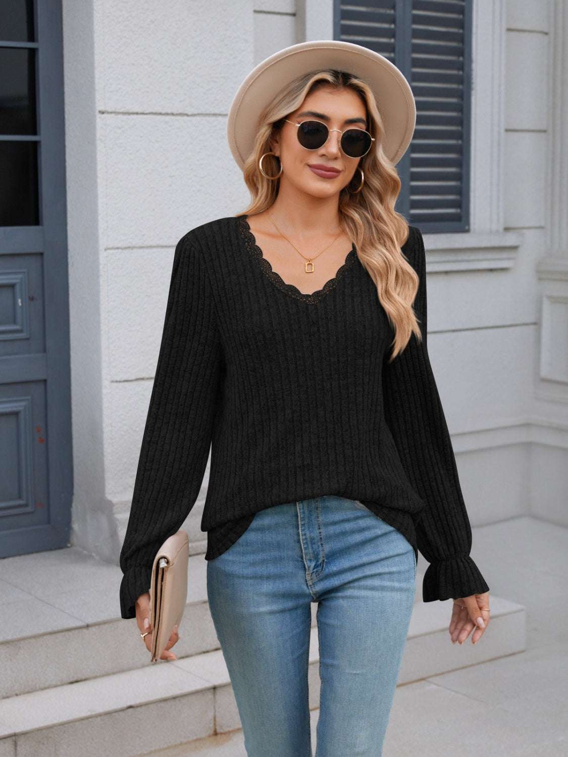 Lace detail V-neck long sleeve t-shirt with ruffled cuffs and slight stretch.
