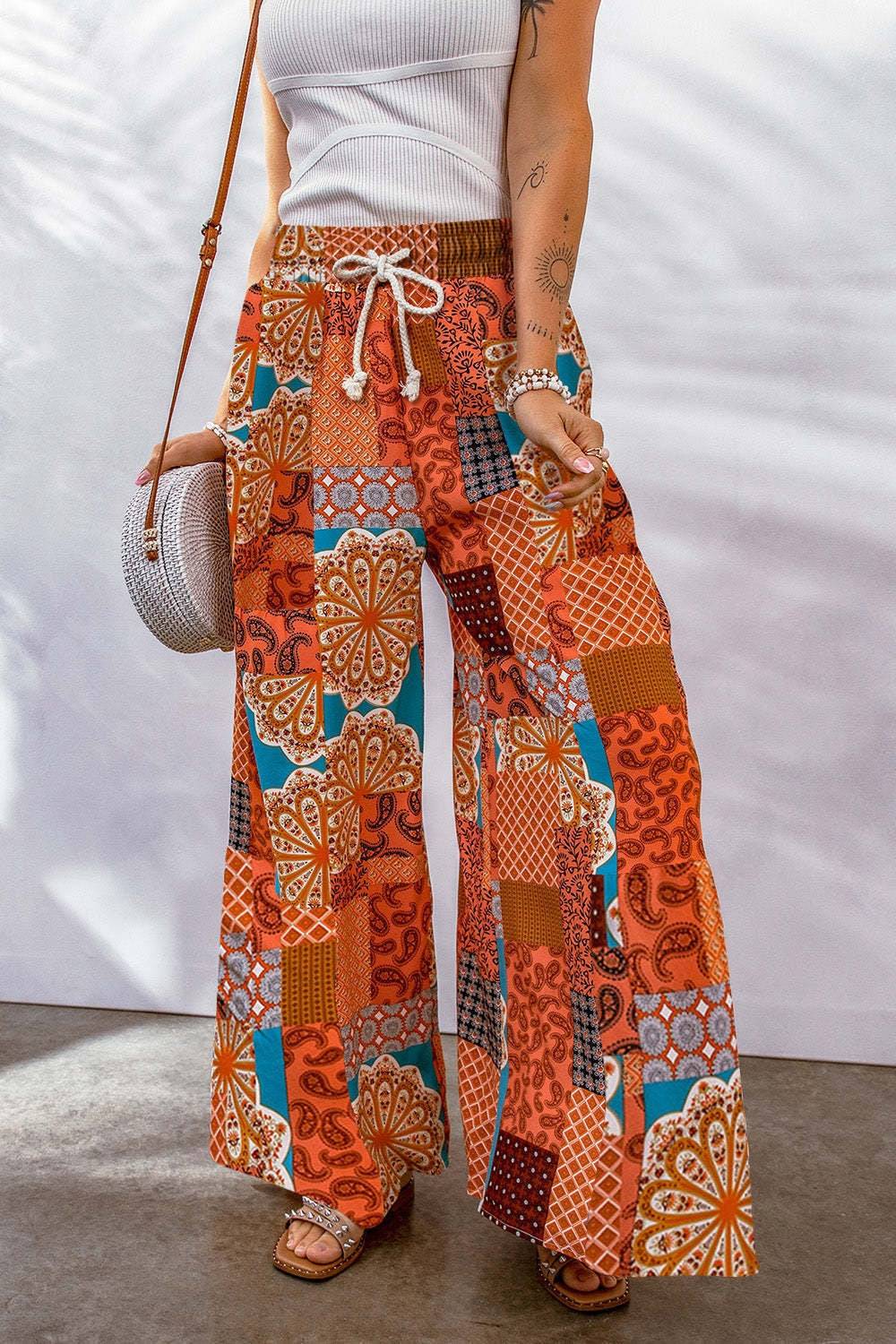 Full-size drawstring printed wide leg pants in vibrant patterns.
