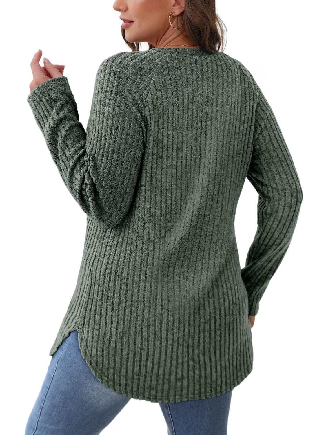 Round neck raglan sleeve t-shirt, slightly stretchy, slit detail, 65% rayon, 35% polyester.