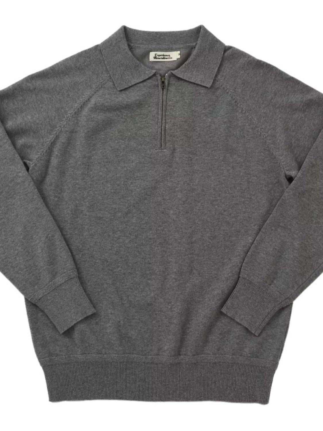 Men's plus size gray quarter zip raglan sleeve polo shirt with moderate stretch.